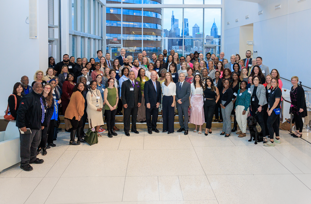 Group photo of Penn Medicine leaders with dozens of CAREs grant recipients and their community partners